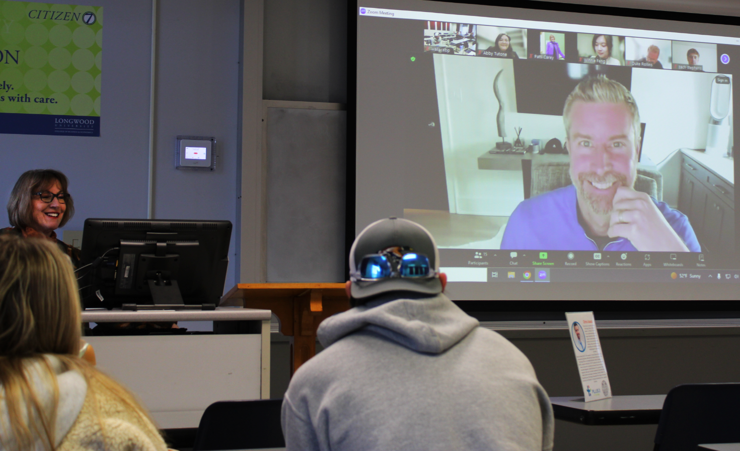 Speaker joins business students via Zoom.