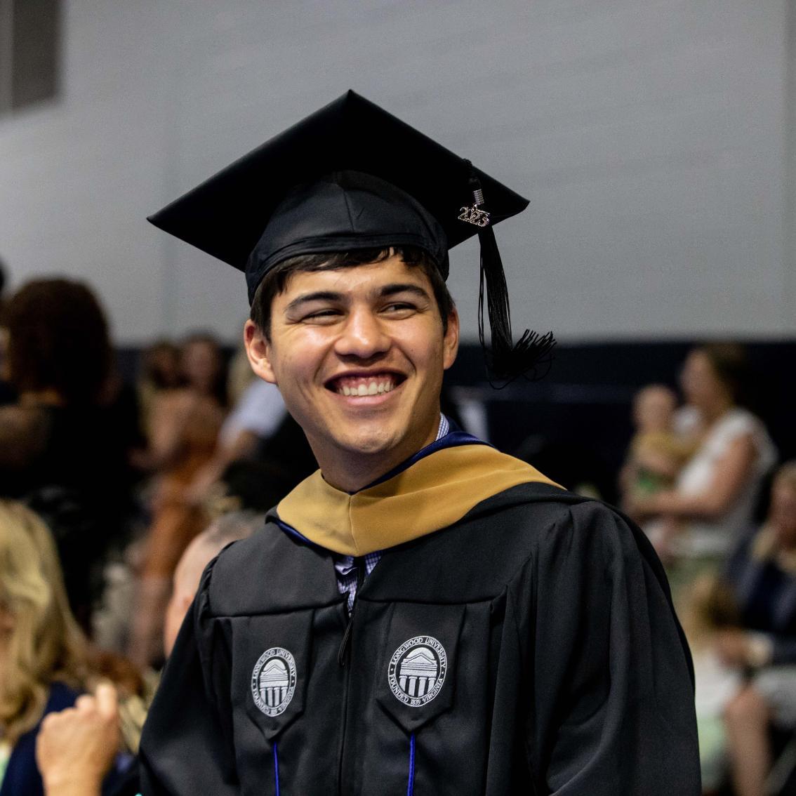 Student during graduate commencement ceremony