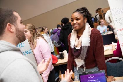 Students talk at the involvement fair