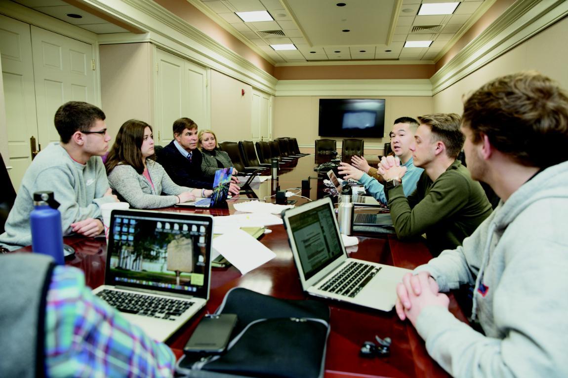 Dr. Tim Pierson discusses campus issues with student leaders at a Student Government Association (SGA) executive meeting. 