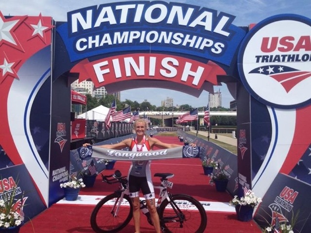 Catherine Hanson at the finish line with the Longwood Scarf