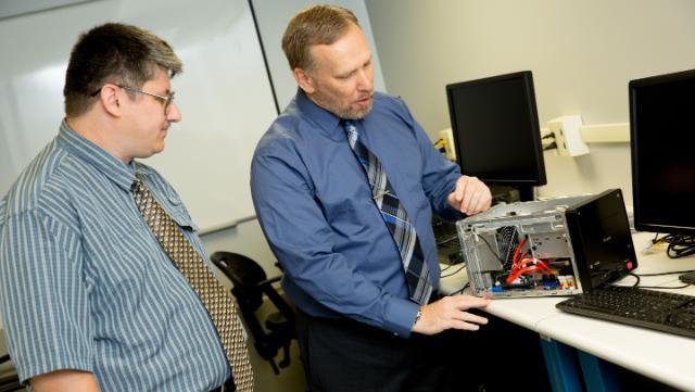 Dr. Robert Marmorstein and Dr. Darrell Carpenter