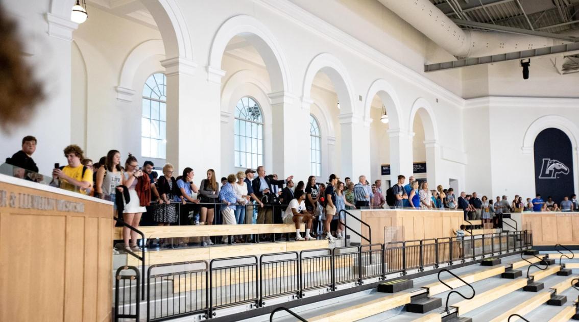 The crowd gets its first view of the interior of the Joan Perry Brock Center